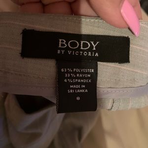 1 striped Skirt & one tan with 3 buttons on back